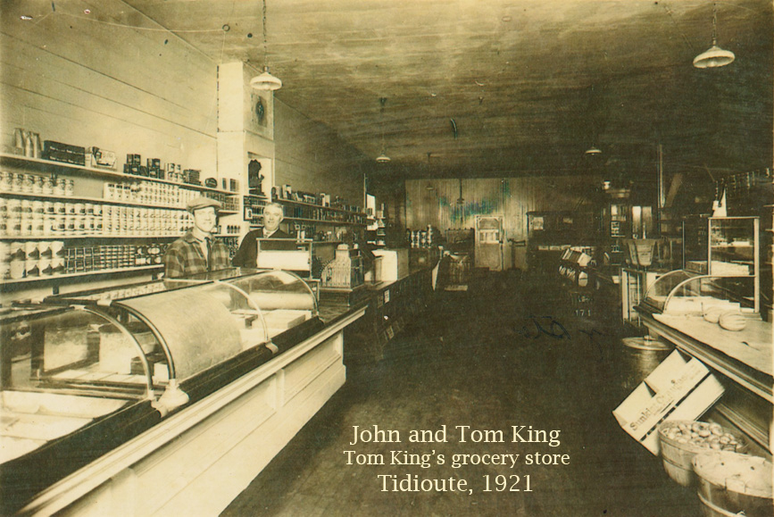 John and Tom King in Tom's grocery store, Tidioute, 1921